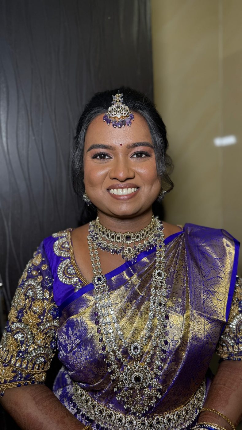 Bride in royal blue silk saree