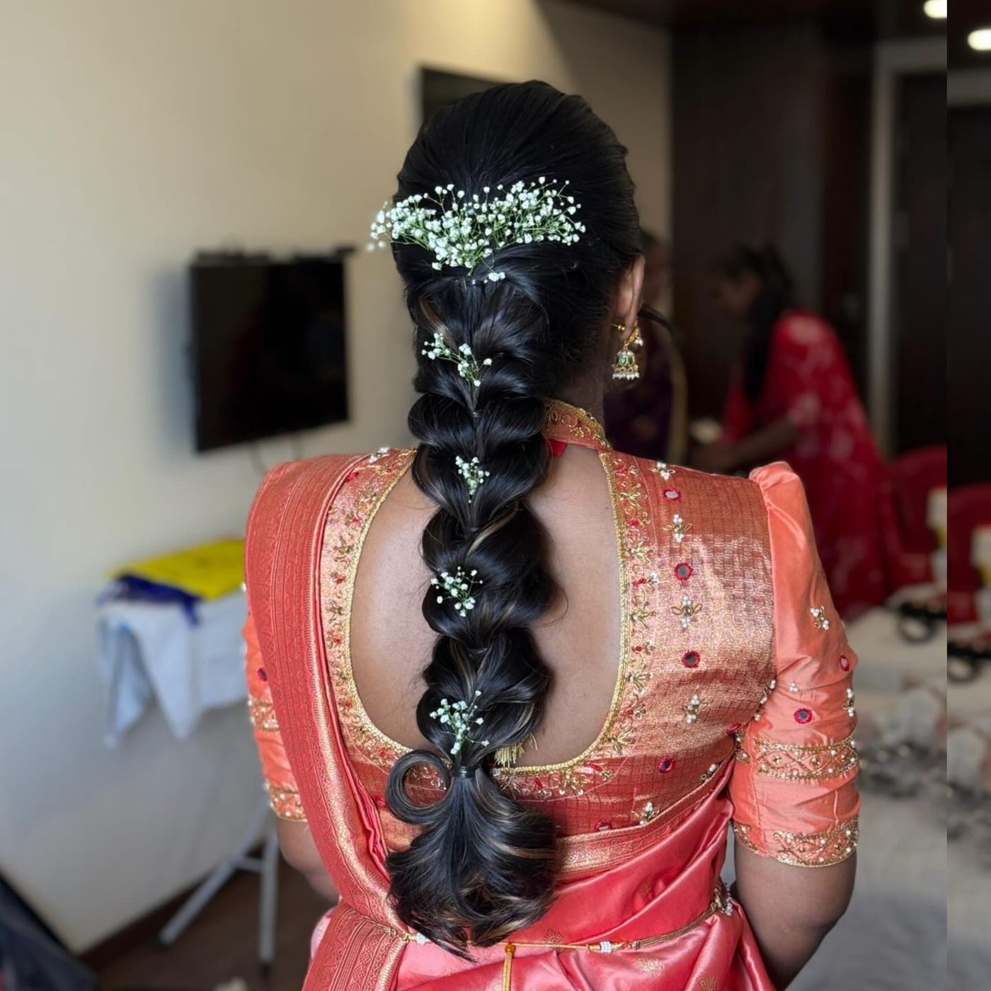Braid with baby breath flowers