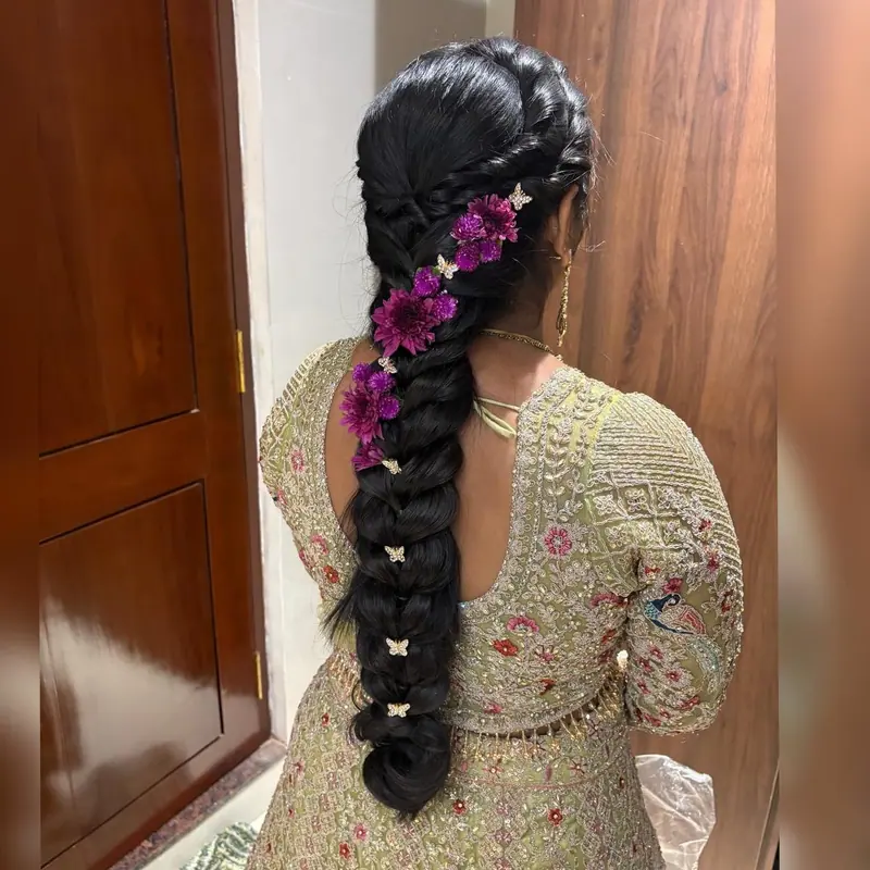 Black braid with purple orchids, back view